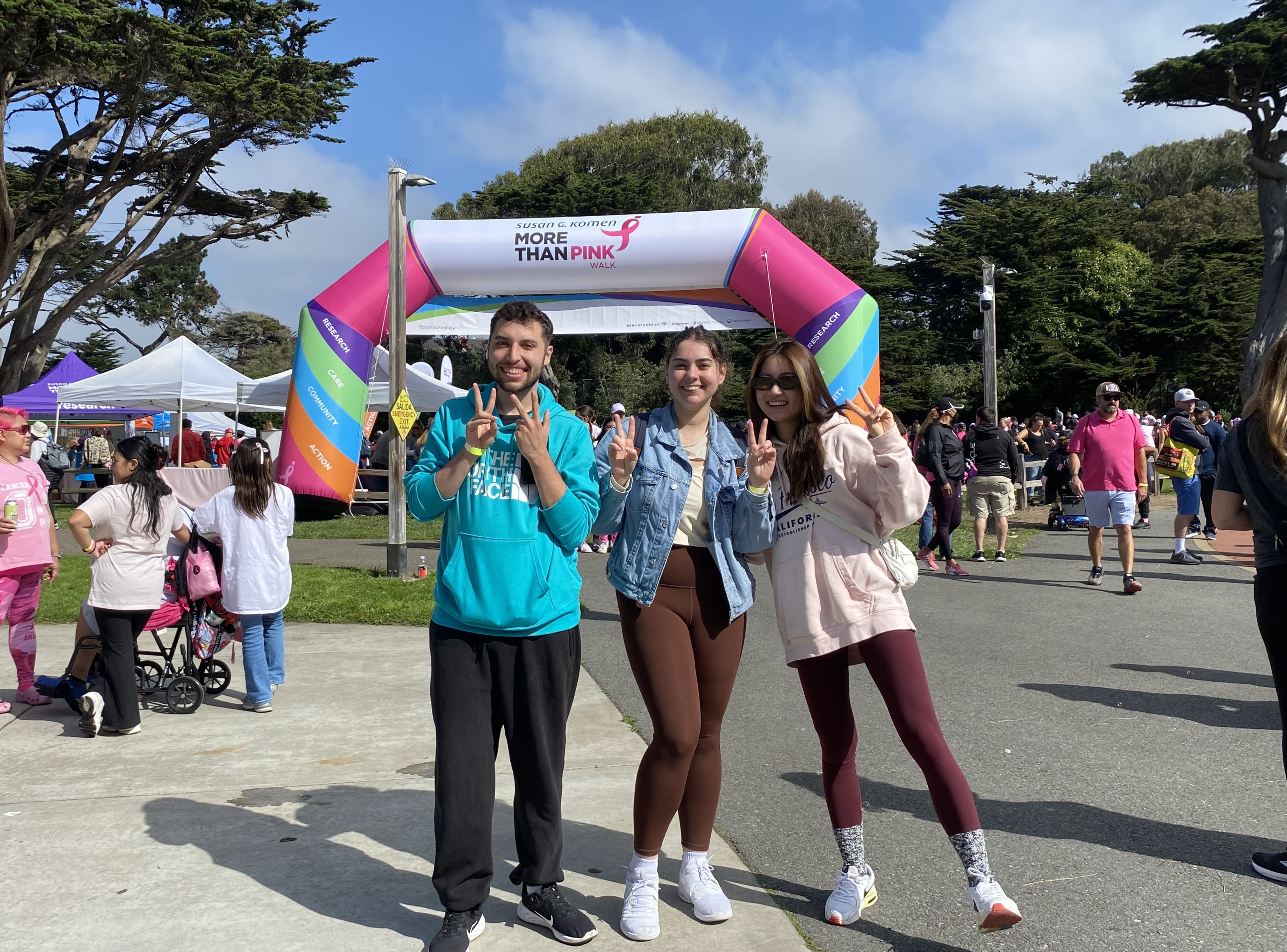 students in pink walk