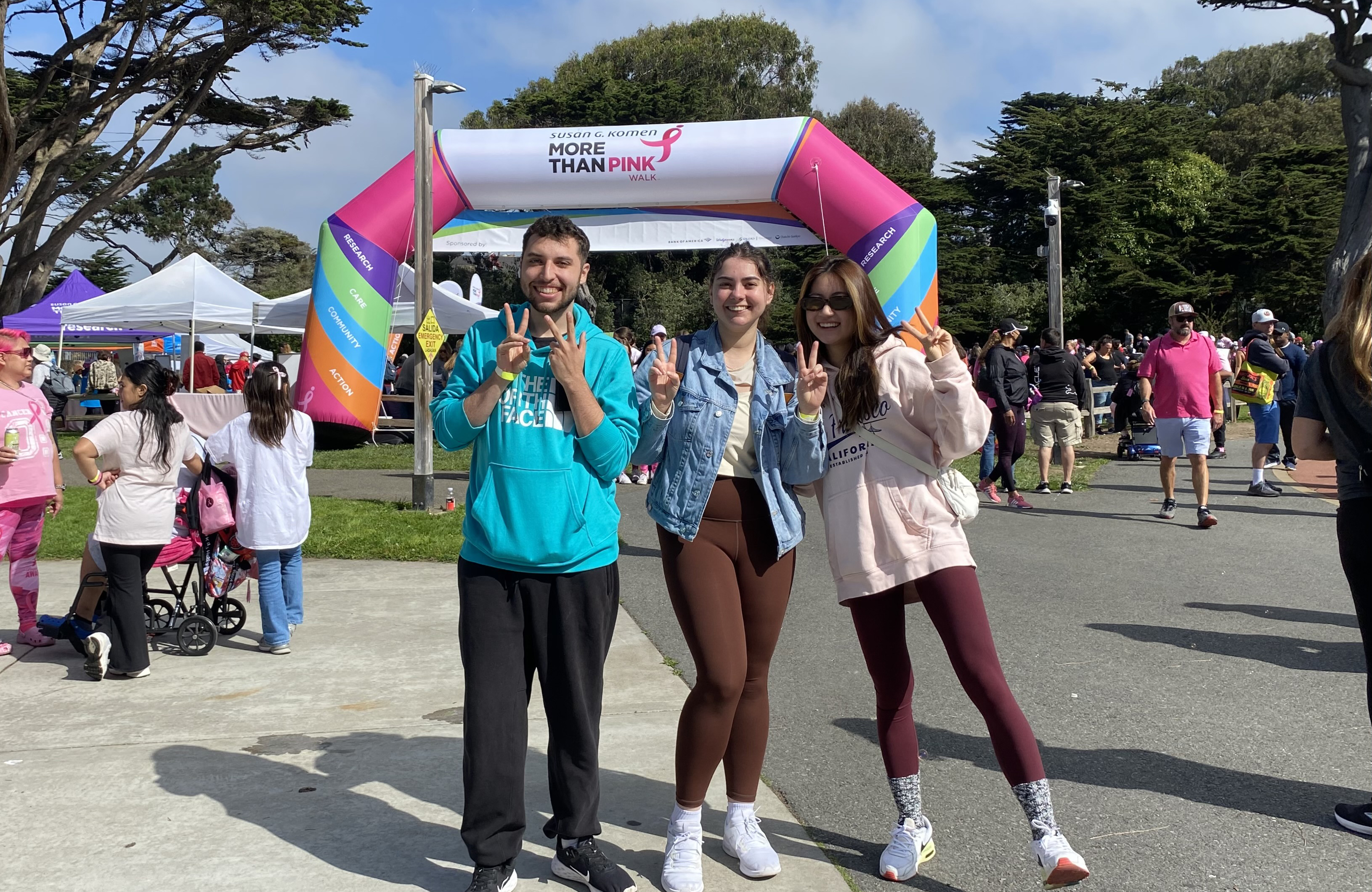 students in pink walk